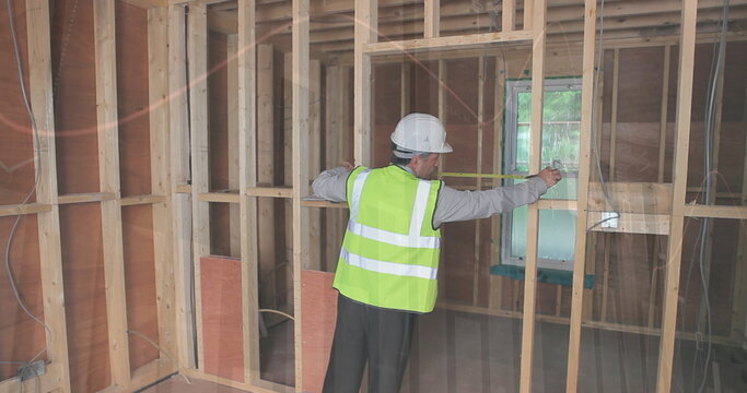 Image of statistics processing over male engineer measuring at construction site