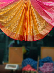 Close up of Colorful traditional Sari, saree displayed in India. natural silk, cotton fold fabric...