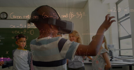 Image of mathematical equations over schoolchildren using vr headsets