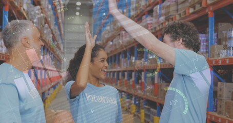 Image of statistics and data processing over smiling volunteers working in warehouse