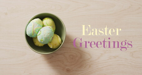 Obraz premium Image of easter eggs and easter greetings text