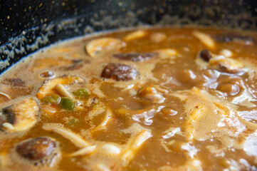 Step by step: Rice enriching itself with the flavor of the stir-fry.