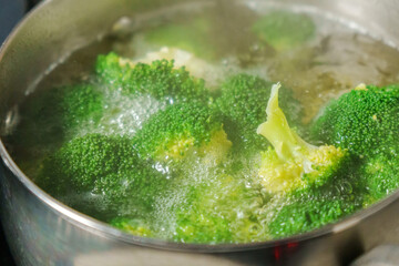 Vibrant broccoli to a bubbling pot of boiling water, creating a flavorful masterpiece.