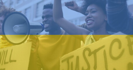 Fototapeta premium Image of flag of ukraine over diverse protesters