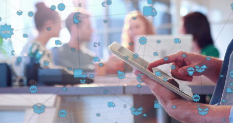 Digital business network connects icons over a team meeting with tablet use.