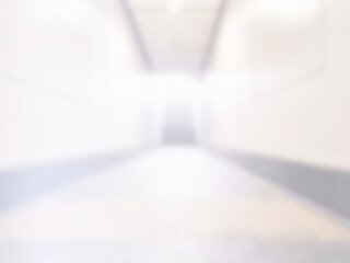 White blurred corridor with stair in the subway background.