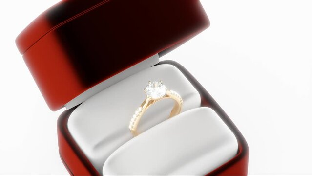 Gold diamond ring in a red box, 3D animation, 3D render diamond ring. Concept for a jewelry and accessories store.