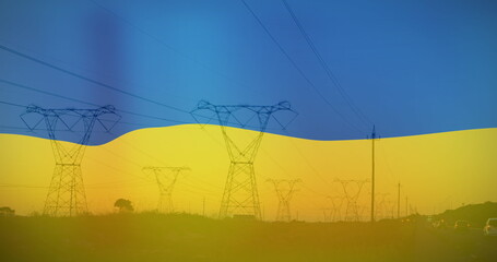 Obraz premium Image of flag of ukraine over field and electricity poles