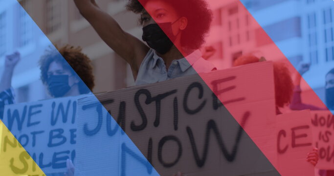 Image of flag of ukraine and russia over diverse protesters in face masks - Powered by Adobe