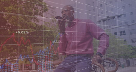 Image of statistic processing over african american man using smartphone in city