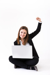 Portrait of a stylish Businesswoman using a laptop.