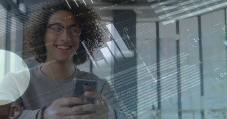 Image of statistics and data processing over man using smartphone