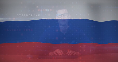 Image of caucasian male hacker over flag of russia
