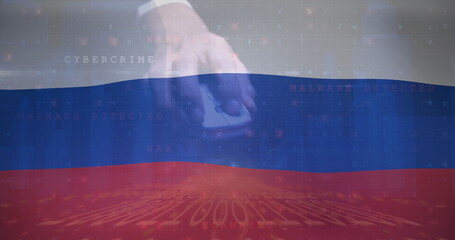 Image of hand of caucasian male hacker over flag of russia