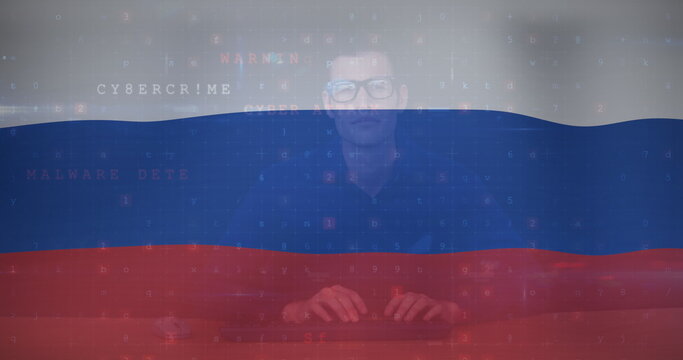 Image of caucasian male hacker over flag of russia