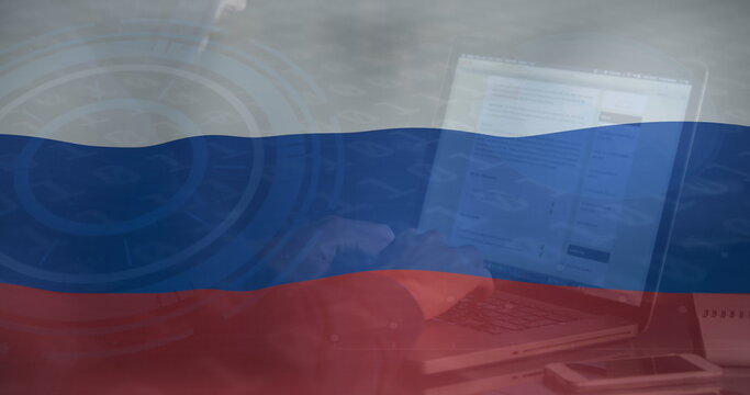 Image of hand of caucasian male hacker over flag of russia
