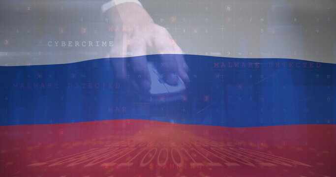 Image of hand of caucasian male hacker over flag of russia