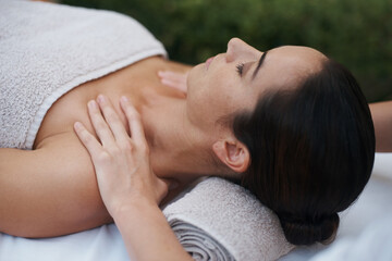 Obraz na płótnie Canvas Spa, woman and hands with massage for wellness at resort, luxury hotel and vacation for relax and therapeutic pamper. People, masseuse or body care with shoulder treatment, hospitality or zen outdoor
