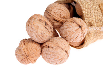 Walnuts are isolated on a white background,