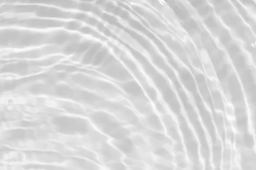 Deurstickers White water with ripples on the surface. Defocus blurred transparent white colored clear calm water surface texture with splashes and bubbles. Water waves with shining pattern texture background. © Water 💧 Shining 📸