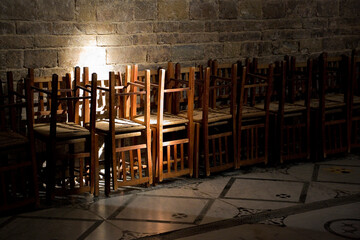 Empty church and crisis of religion concept with wooden chairs s - obrazy, fototapety, plakaty