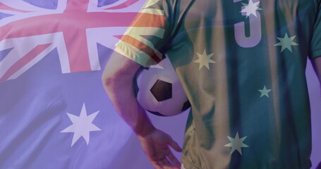 Image of caucasian male soccer player over flag of australia