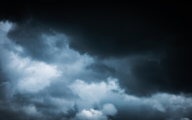the dark clouds sky in black. Stormy rain clouds background.