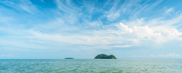 Ocean, island and blue sky background. Rat and cat islands at Samila beach, Songkhla, Thailand.