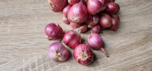 Red onions for cooking on the table.
