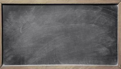Foto op Plexiglas Chalkboard blackboard. Chalk texture school board display for background. chalk traces erased on board with copy space for add text or graphic design. Education concepts © Uuganbayar