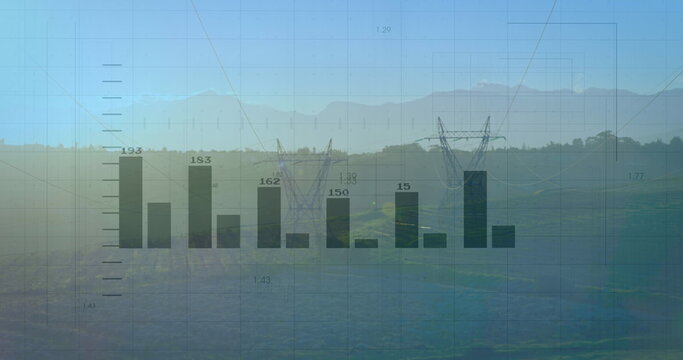 Image of financial data processing over electricity pylons and landscape