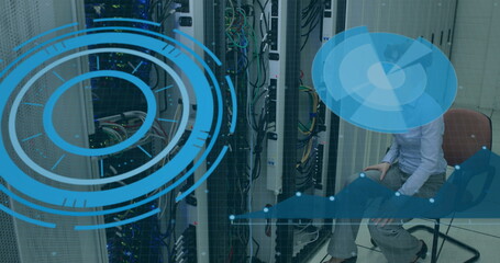 Image of interface with data processing over caucasian female engineer working at server room