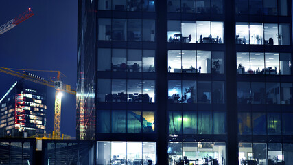 Office building at night, building facade with glass and lights. View with illuminated modern skyscraper. - 757818909