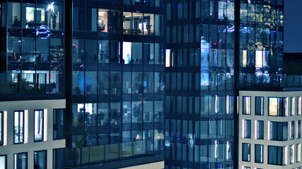 Office building at night, building facade with glass and lights. View with illuminated modern skyscraper. - 757820788