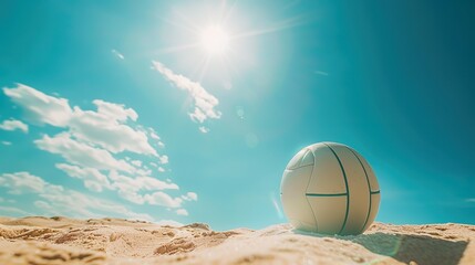 BEACH VOLLEYBALL. GAME BALL UNDER SUNLIGHT AND BLUE SKY.
