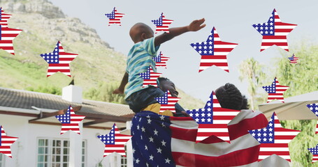 Image of stars with flag of united states of america waving over smiling african american family