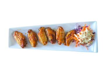 Sushi with chopsticks on a plate, surrounded by various delicious grilled and fried meats, seafood, and gourmet dishes, creating a mouthwatering dinner spread