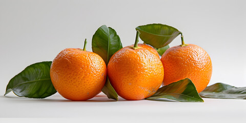 Ripe fresh juicy tangerines with leaves on white background, Tangerine fruit food.