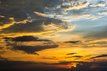 sunset sky with multicolor clouds. Dramatic twilight sky background
