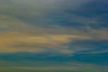 sunset sky with multicolor clouds. Dramatic twilight sky background
