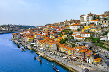 Aerial view of Porto cityscape by the riverbank of the Douro River, Portugal - obrazy, fototapety, plakaty