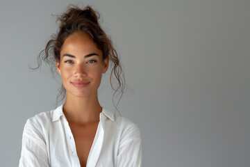 African-American girl in a white shirt , portrait in the studio