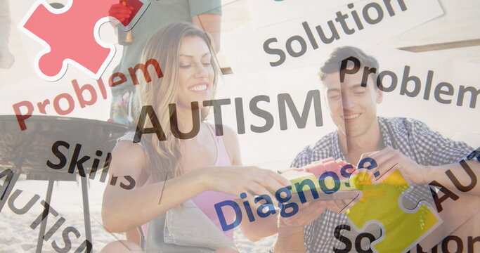 Image of colourful puzzle pieces and autism text over happy friends at summer beach party