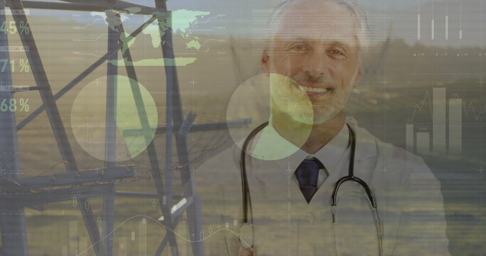 Image of data processing with pylons and landscape over caucasian male doctor