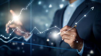 Businessman drawing, writing and planning stock market, financial candle light chart