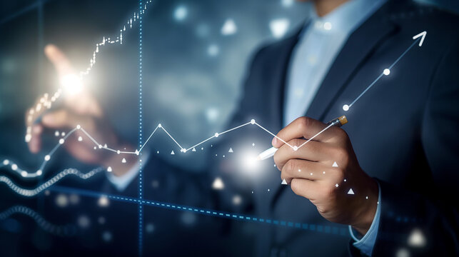 Businessman drawing, writing and planning stock market, financial candle light chart