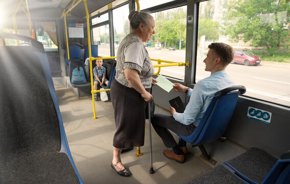 A man evangelizes in public transport