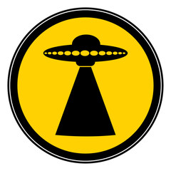 vector yellow round icon with black ufo ship. alien danger sign © Marina