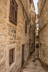 Historic residential buildings in a quiet back street in the city of Split in Croatia