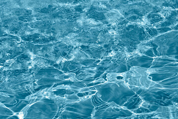 Fototapeta na wymiar Detail of rippled water surface in a fountain